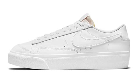 all white Nike blazers low